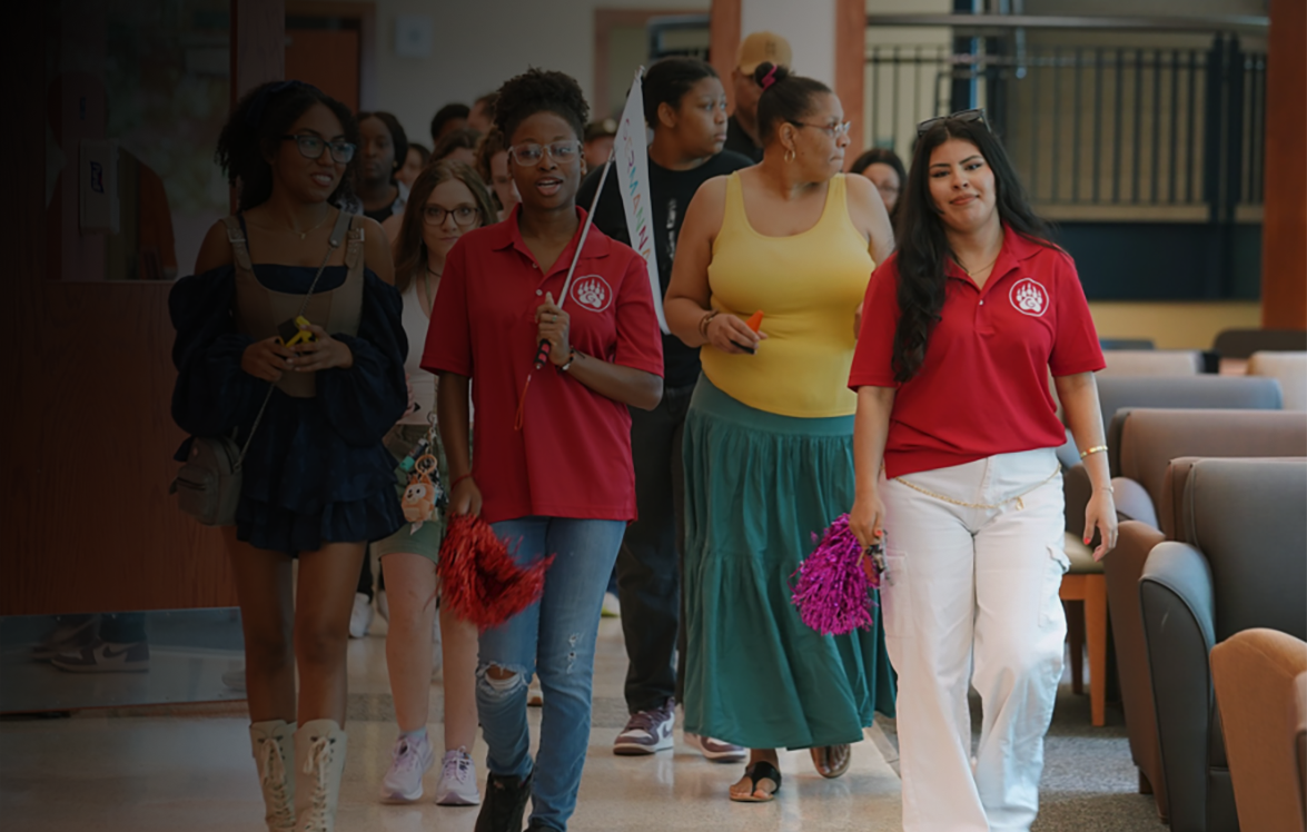 Students lead a tour at an open house