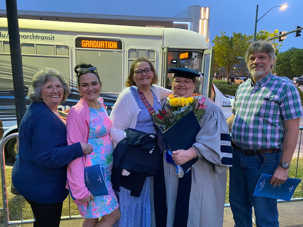 Dr. Rapids shown with her family after graduating with her doctoral degree