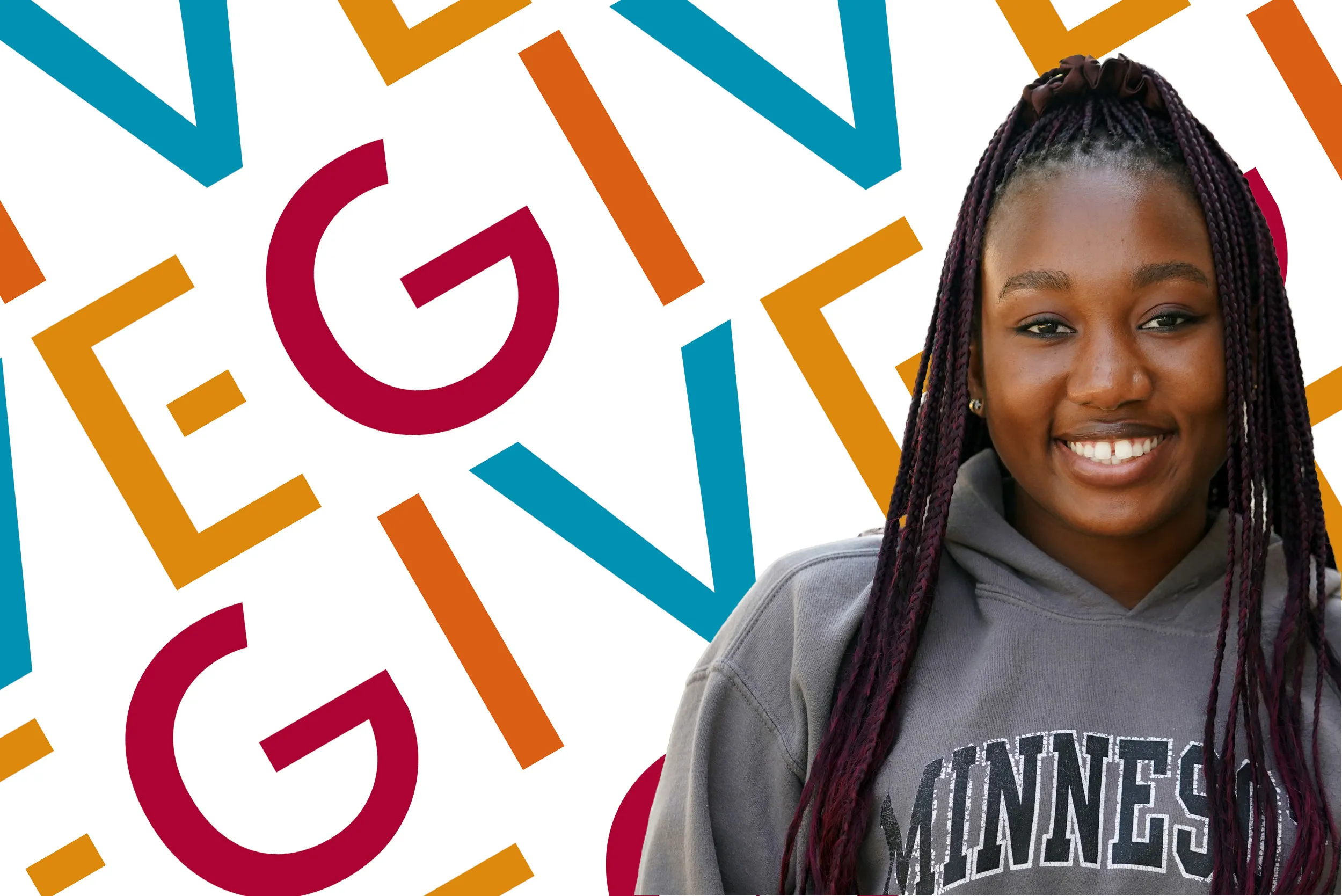 Germanna student smiling in front of a colorful background