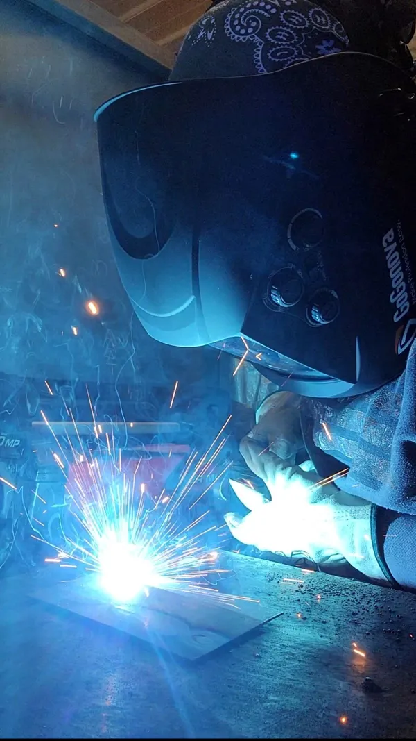 Ms. McKendree shown welding