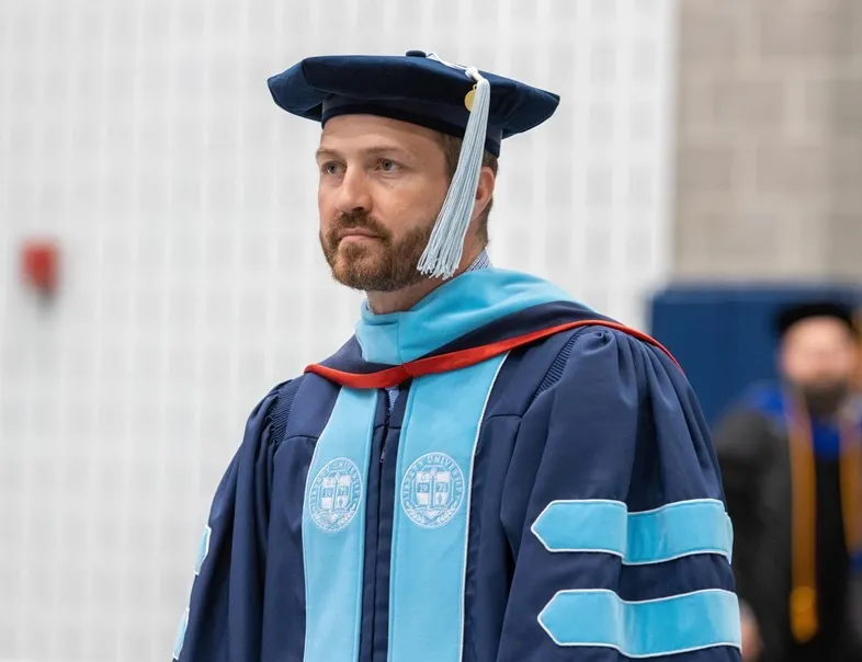 Dr. Nathan Schrenk shown in his doctoral regalia at Germanna’s May 2022 Commencement Ceremony