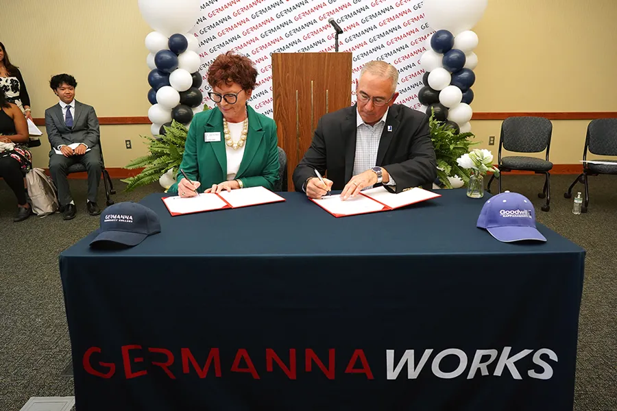 Germanna President Dr. Janet Gullickson (left) shown signing the official partnership documentation with RGI President and CEO Steve Cox [Credit: Suzanne Rossi]