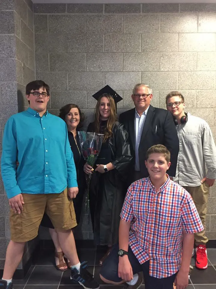 Professor Stephanie Bettis shown with her family after graduating from Germanna