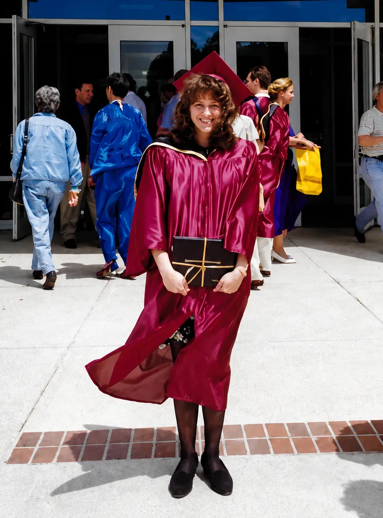 Becky Morris graduating from Germanna in her cap and gown