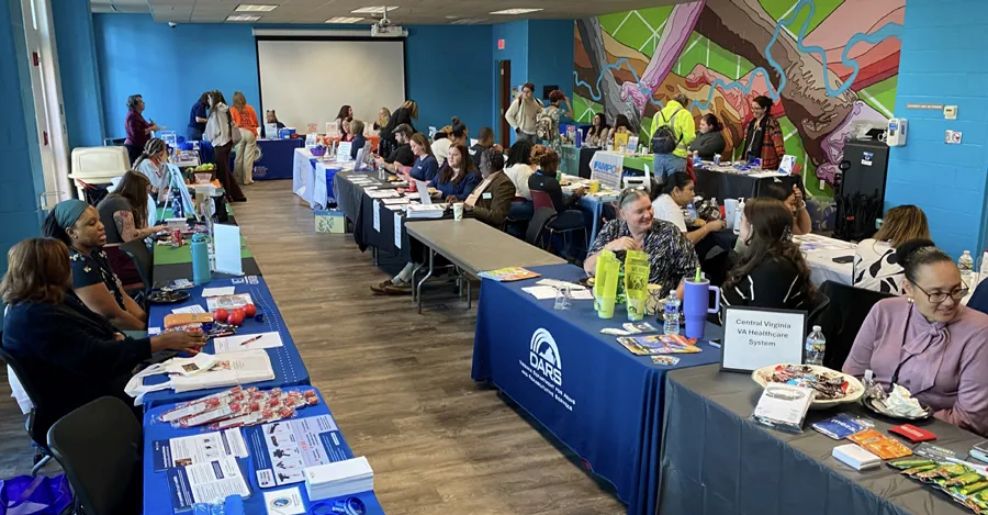 Germanna staff and representatives from local businesses run information tables at a community resource fair