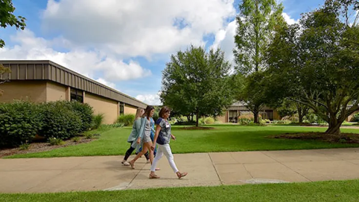 Students walking outside of the Locust Grove Campus