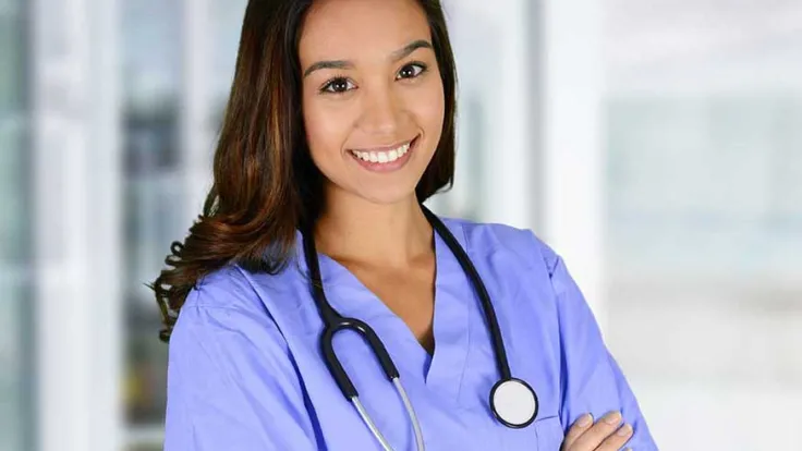 Nurse standing in a healthcare clinic