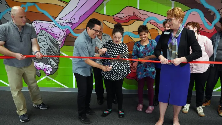 Sofia Pineda cuts ribbon for Germanna mural