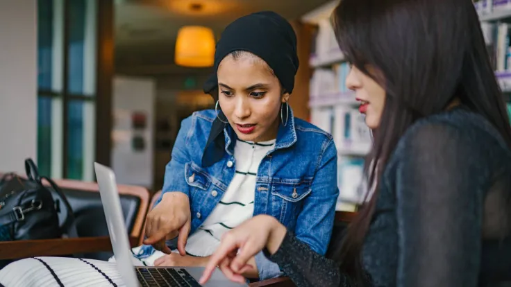 International students on laptop