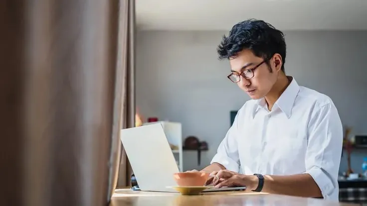 Student on Laptop