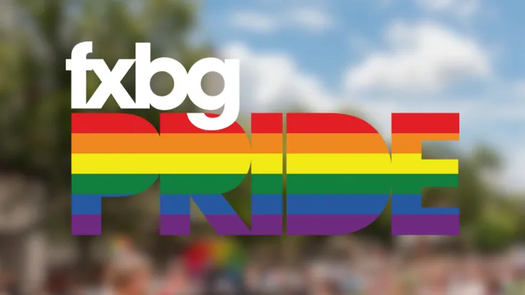 The Fredericksburg Pride logo superimposed over a photo of a festival