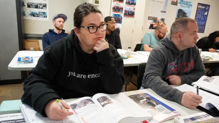 Students listen in the classroom during a CDL training class