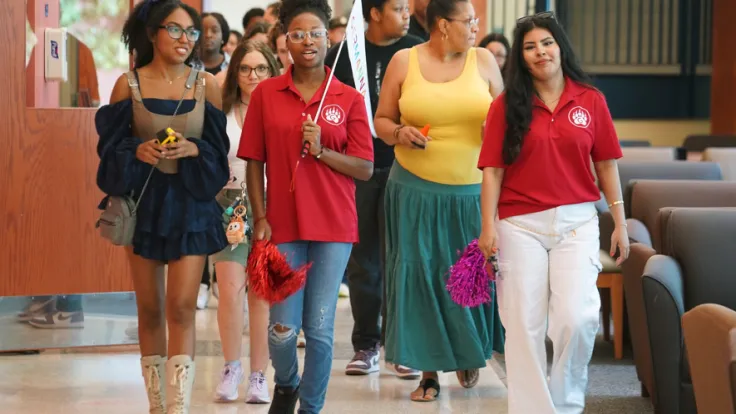 Students lead a tour group at a Germanna open house